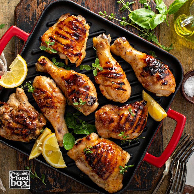 Cornish chicken drumsticks cooked in a pan