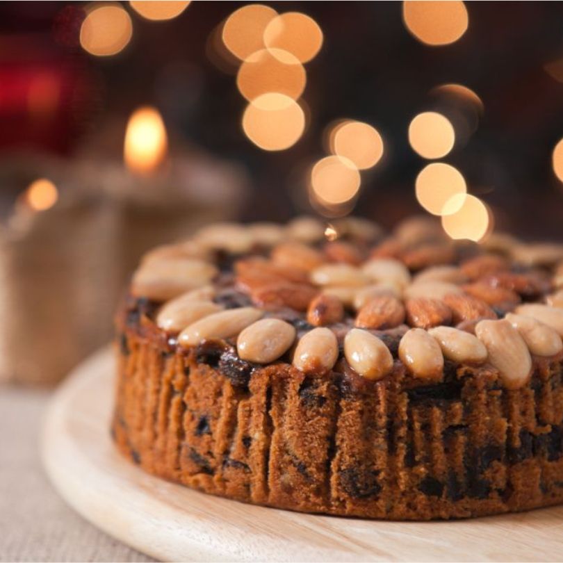 Honeys Cornish Dundee cake, a light marmalade fruit cake topped with a traditional ring of almonds
